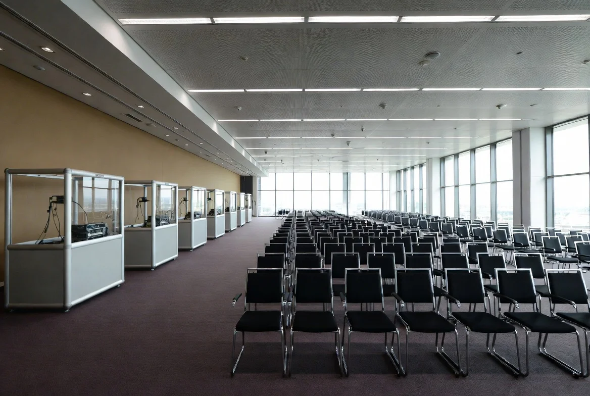 Professional interpreter at corporate conference and multilingual business event